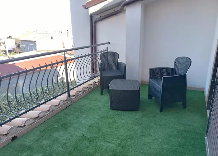 Pensión Le Luci In Attico Gran Vista Interno 4 Rose Bianche