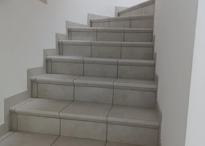 Pensión Le Luci In Attico Gran Vista Interno 4 Rose Bianche